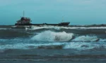 Rus gemisi Akdeniz’de İHA saldırısına uğradı haberine ait açık denizde seyreden kargo gemisi görseli